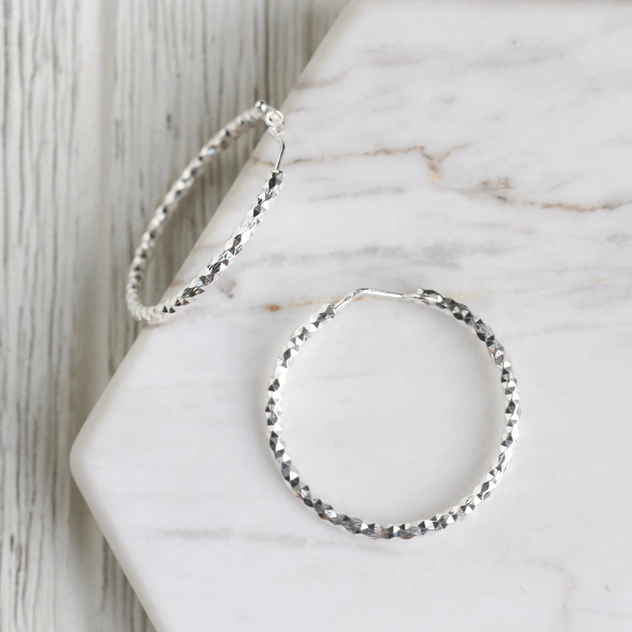 Small Sterling Silver Faceted Hoops